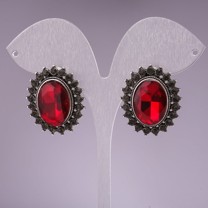 Classic earrings with burgundy oval crystals in a rhinestone setting, 27 x 23 mm