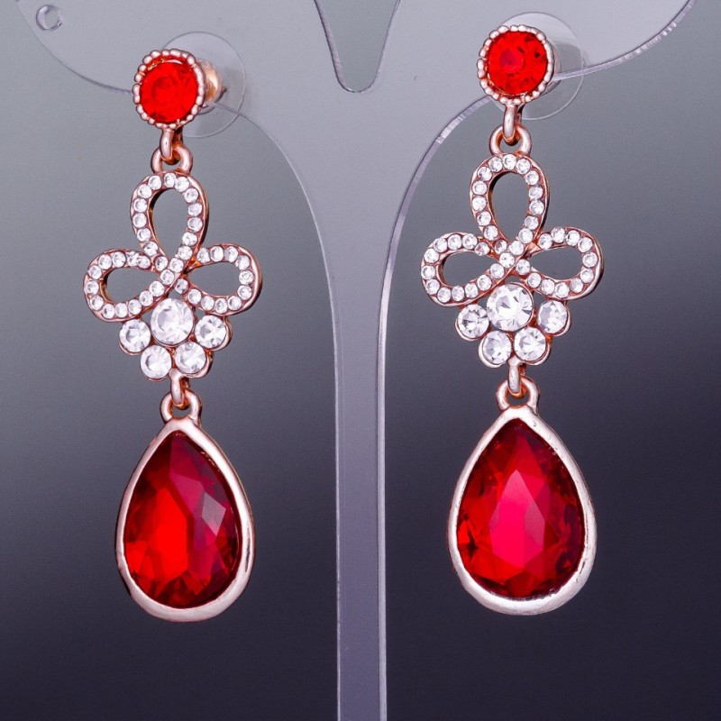 Ruby crystal earrings with a gold-tone drop