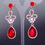 Ruby crystal earrings with a gold-tone drop