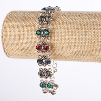 Two-row bracelet with colored crystals in a 'drip silver' finish, length 17–22 cm