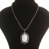 Large pendant on chain, dark gray mother-of-pearl, metal with crystals, oval setting 50×38 mm, length 46–54 cm, striped