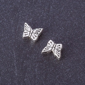 Bead-insert 'Butterfly', metal color 'silver', dia 7x9 mm, packaging 20 g +/- 33 pcs