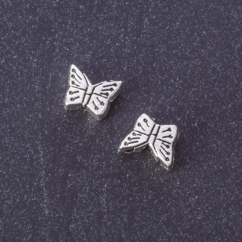 Bead-insert 'Butterfly', metal color 'silver', dia 7x9 mm, packaging 20 g +/- 33 pcs