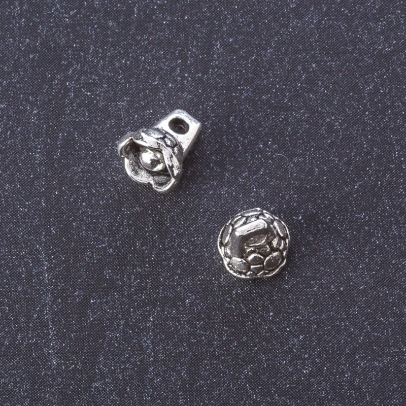Bell pendant findings, metal color 'Silver', length 8 mm, packaging 20 g, ±47 pcs