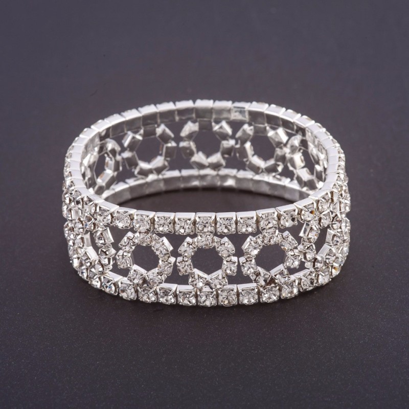 Rhinestone stretch bracelet with 'rings' pattern, white crystals, width 19 cm, circumference 18.5 cm, metal color 'silver'