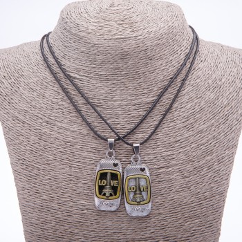 Twin pendant of friendship Love on a cord, length 45 cm, metal color 'silver and bronze'