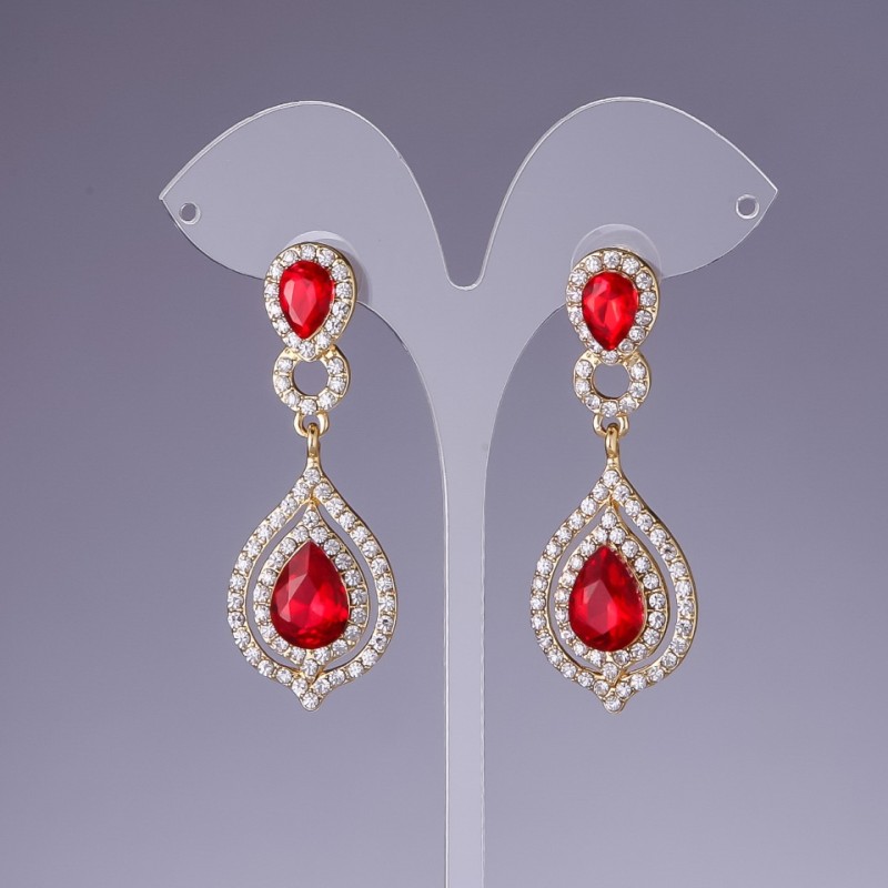 Earrings with red crystals, 6 cm long, yellow metal