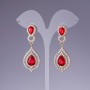 Earrings with red crystals, 6 cm long, yellow metal
