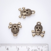 Skull pendant finding 13x17mm Bronze finish +/- 13pcs