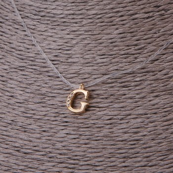 Pendant, 9 mm diameter on invisible silicone cord, length 39–44 cm