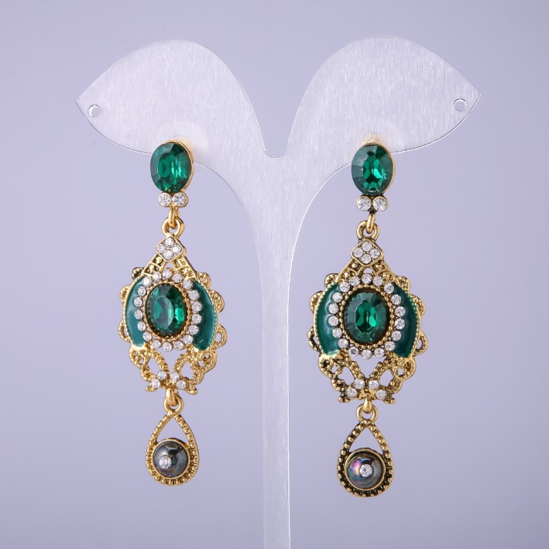 Earrings in Eastern style with green crystals, 65 mm long