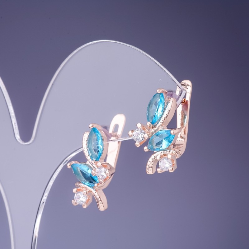 Earrings with blue crystals 19x12 mm in gold-toned metal