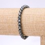 Hematite bracelet with a faceted bead, 6 mm diameter, 18 cm length on elastic