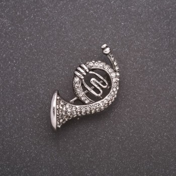 Brooch 'Trumpet Horn' with rhinestones gray metal 35x20mm