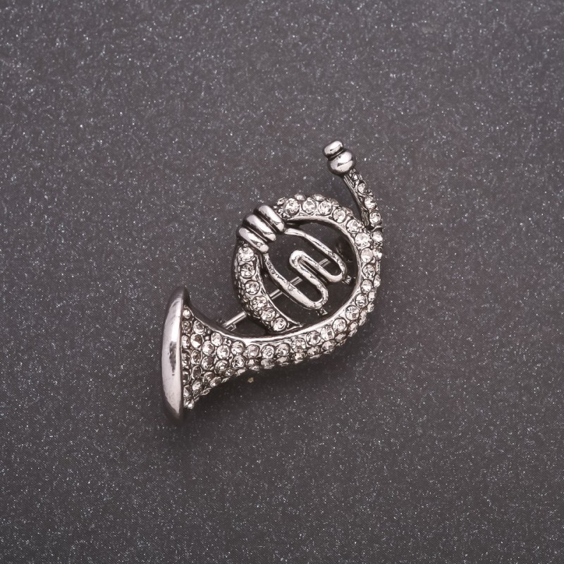 Brooch 'Trumpet Horn' with rhinestones gray metal 35x20mm