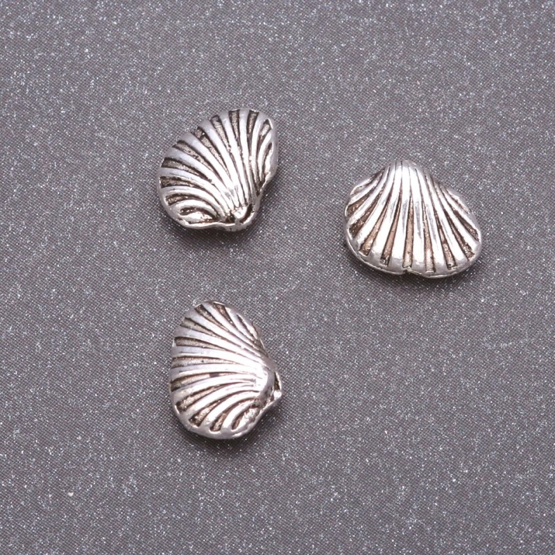 Bead insert findings, diameter 10x9 mm, diameter in-1, 5 mm, fac. 20 g +/- 16 pcs