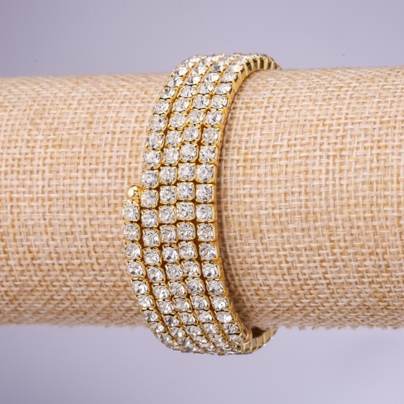 Rhinestone bracelet 'Memori' with four turns, white rhinestones, 4 mm diameter, gold-tone metal