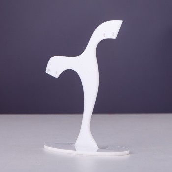 White plastic jewelry stand, height 7 cm, width 7 cm