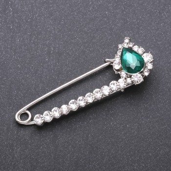 Discount! Brooch pin with green glass crystals 64×22 mm white metal