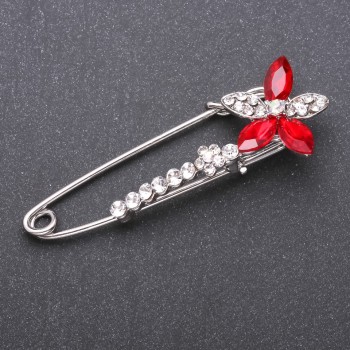 Discount! Brooch-pin with red glass crystals 68x23mm white metal