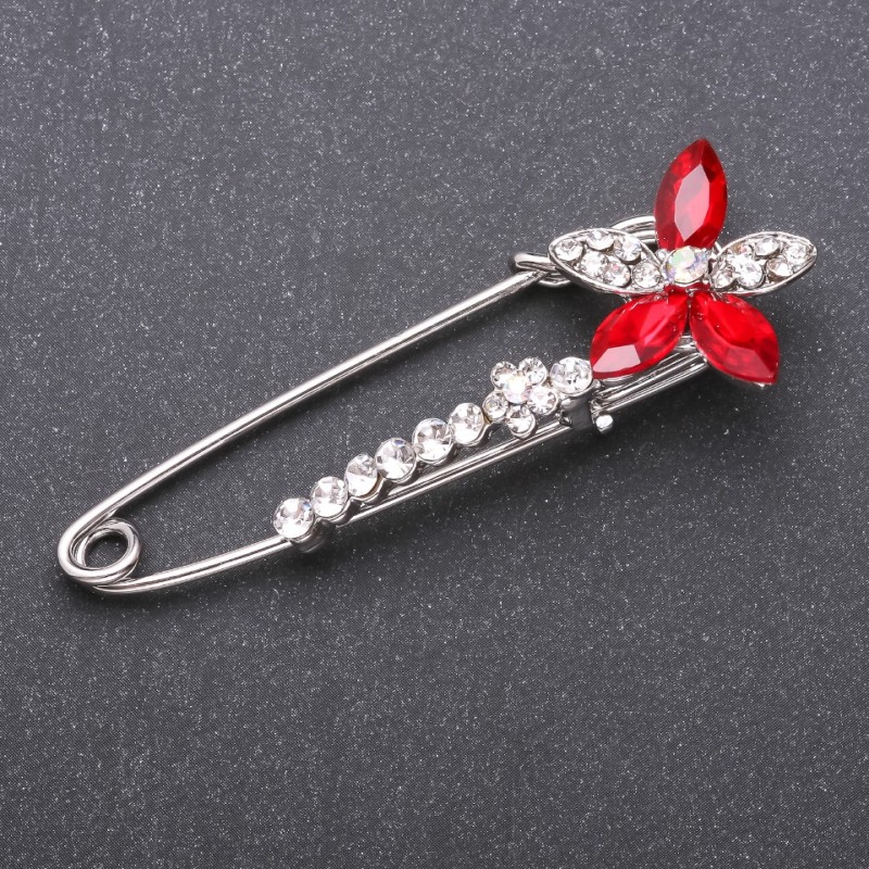 Discount! Brooch-pin with red glass crystals 68x23mm white metal