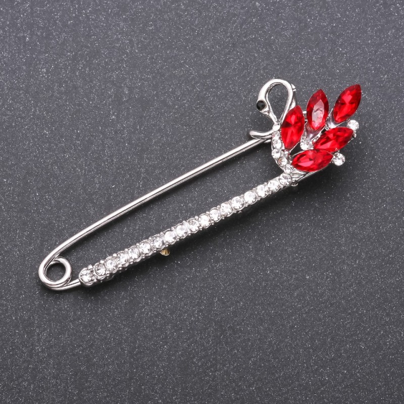 Discount! Brooch-pin with red glass crystals 73×22 mm white metal