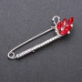 Discount! Brooch-pin with red glass crystals 73×22 mm white metal