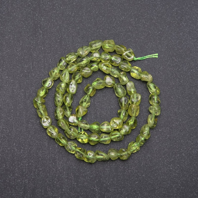 Beads on a thread of natural chrysoprase, faceted, diameter 6x5 mm ±, length 40 cm