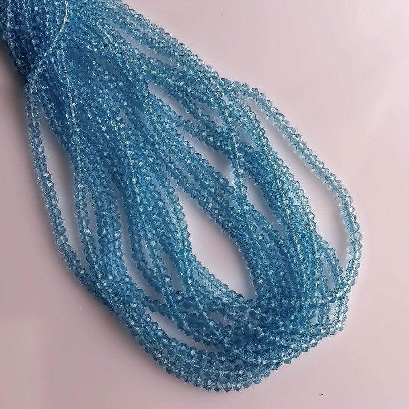 Beads Czech Crystal transparent light blue "Rondelle", diameter 3.5×2.5 mm, thread length 40 cm