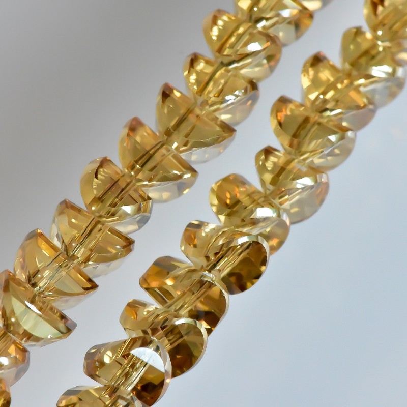 Crystal beads in Swarovski champagne style with a mirror finish, diameter 6x4 mm, on a 50 cm strand