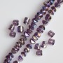 Crystal beads in Swarovski style lilac with golden 'Gasoline' plating, diameter 2.5×4 mm, thread length 48 cm