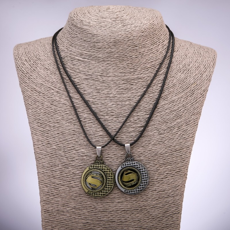 Pair of friendship pendants 'Supermen', length 42-48 cm, diameter 30 mm