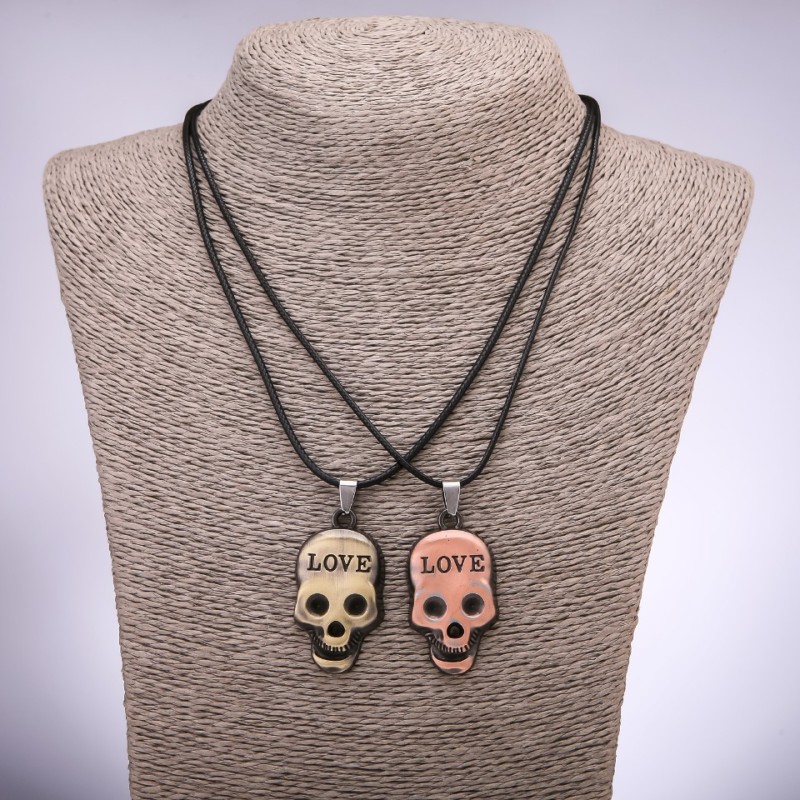 Pair of Skull Friendship Pendants, length 42–48 cm, diameter 40×23 mm