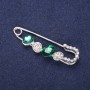 Sale! Mini brooch pin with white crystals and green stones, 50×15 mm, silver metal