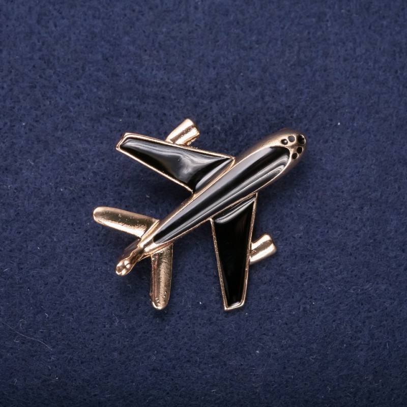 Brooch 'Airplane' enamel black 45x40mm yellow metal