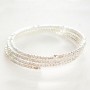 Slim spiral bracelet with three turns, small white crystals, 18-22 cm circumference