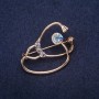 Brooch Stethoscope with crystals, white chameleon color, 37×26 mm, gold-tone metal