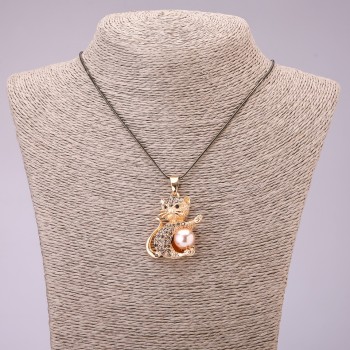 Pendant 'Kitty' with black crystals on a long chain of metal 'black gold', diameter 30x39 mm, length 70 cm