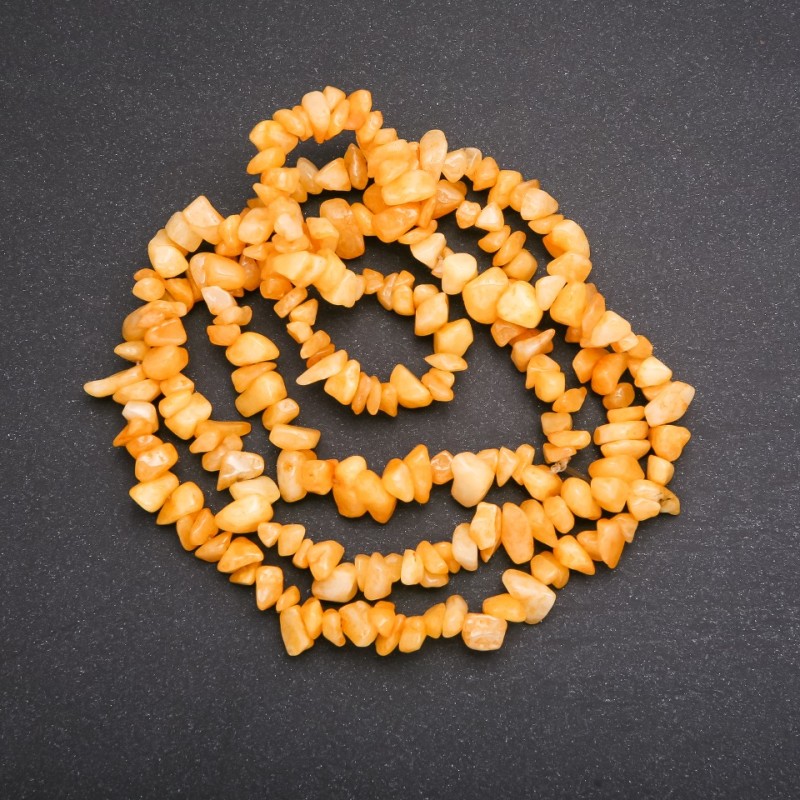 Beads on fishing line, tinted quartz chips, 6 mm diameter, 80 cm length