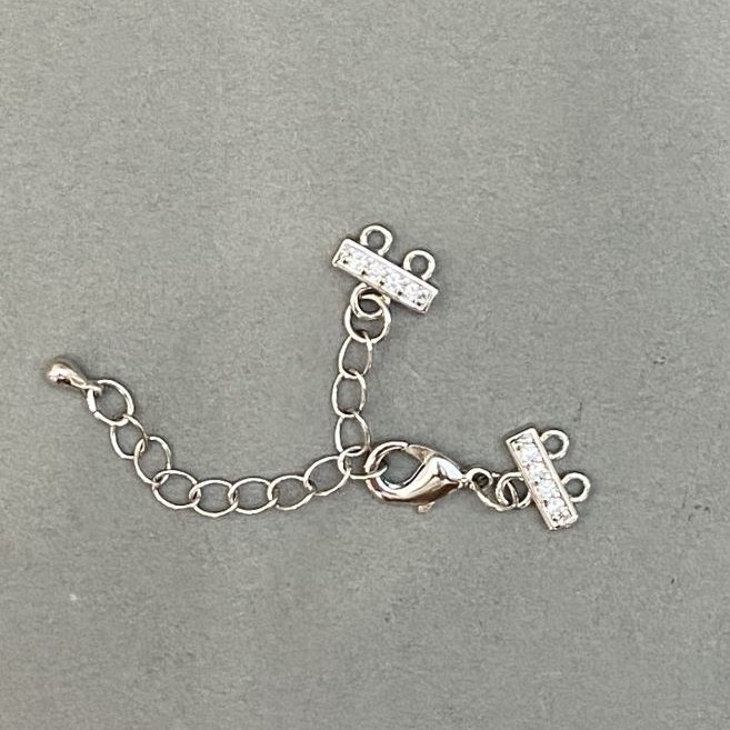 Clasp for two-strand bracelets and beads with crystals and extension chain, silver-colored metal, diameter 9×12 mm, length 5 cm