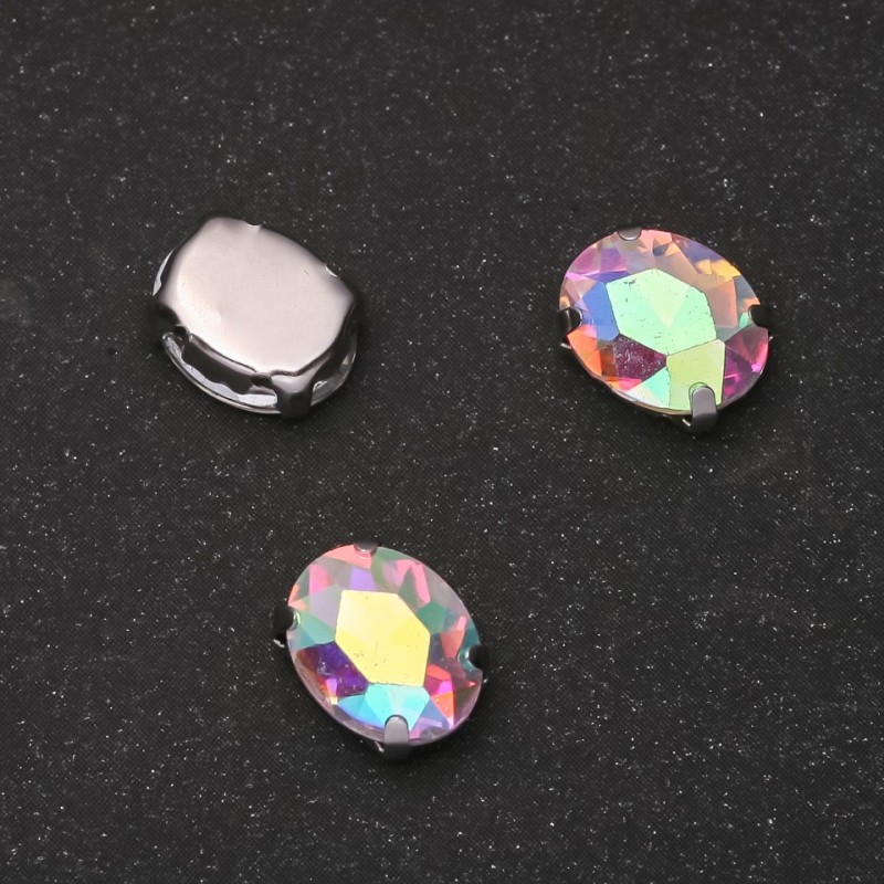 Price per pack /10pcs. Iridescent oval sewn-on crystal in prong setting 10x12 mm