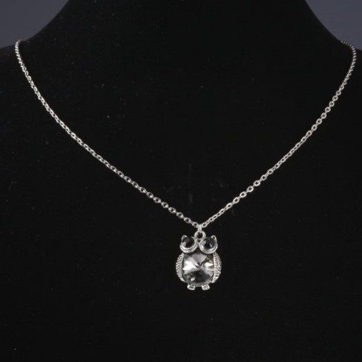 Pendant on a chain Owl with gray crystal, length 52 cm, diameter 2.5 cm