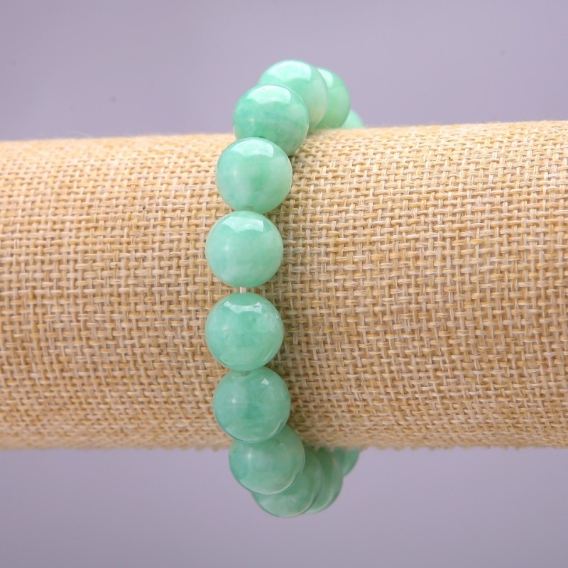 Bracelet of natural Burmese jadeite, smooth beads, 12 mm diameter (±), on an elastic cord, 18 cm long
