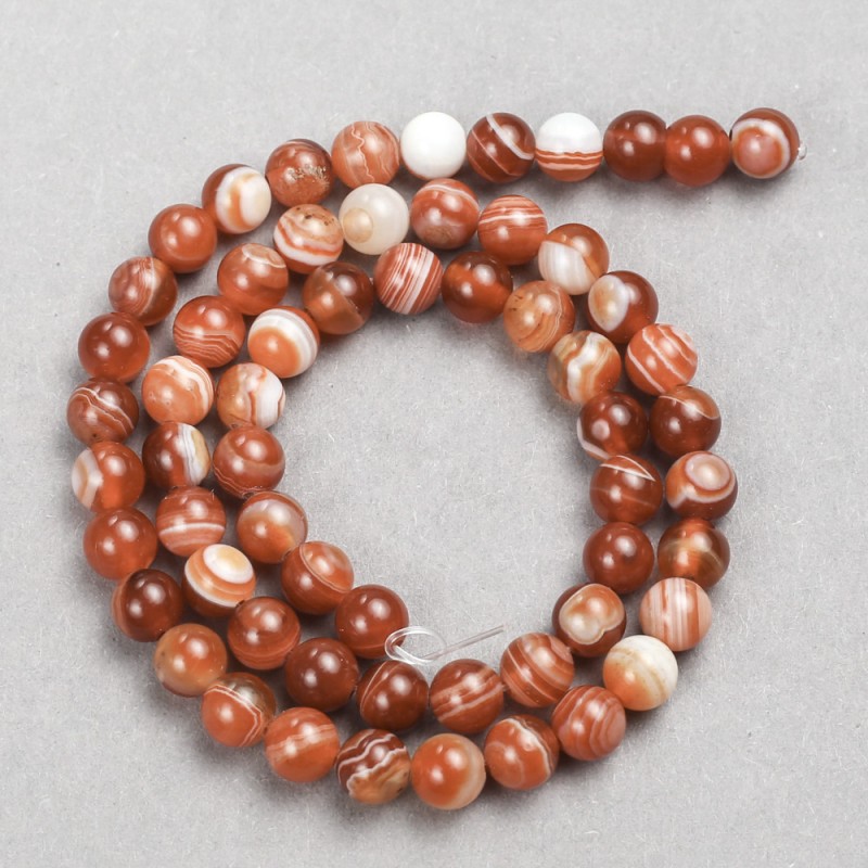 Orange Beads on a String. Smooth round agate beads, 10 mm diameter, 38 cm length.
