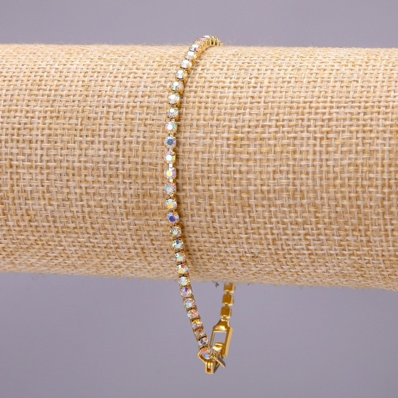 One-row rhinestone bracelet with a clasp, metal color 'gold', length 20 cm, width 3 mm