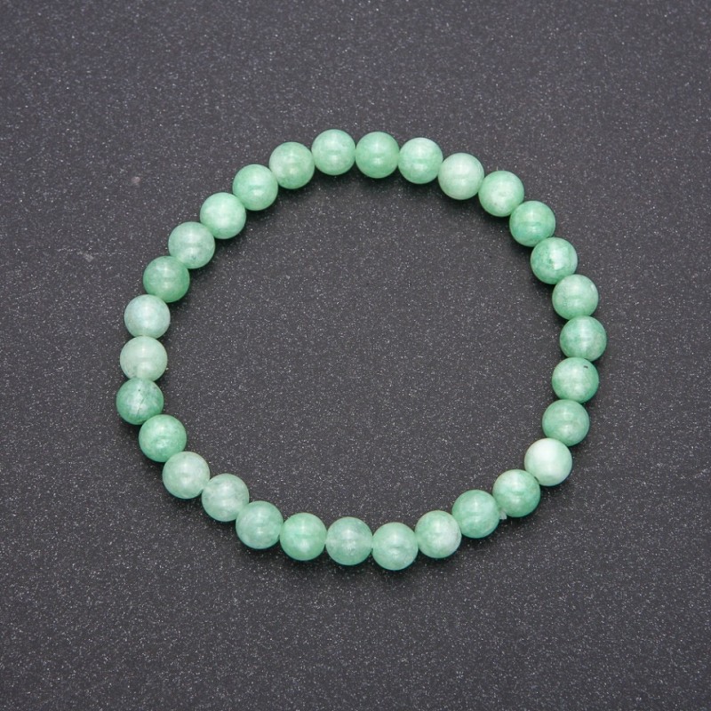 Bracelet made from natural Burmese jadeite on an elastic cord, smooth beads, diameter 6(±)mm, length 18 cm