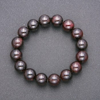Bracelet with natural garnet gemstone on elastic cord, smooth beads, diameter 12 mm (±), length 18 cm