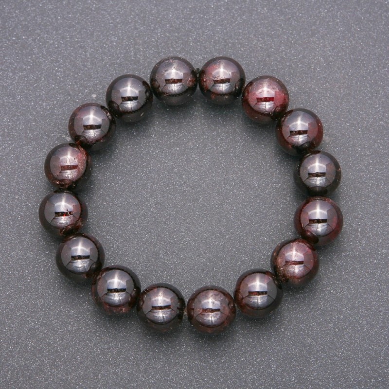 Bracelet with natural garnet gemstone on elastic cord, smooth beads, diameter 12 mm (±), length 18 cm