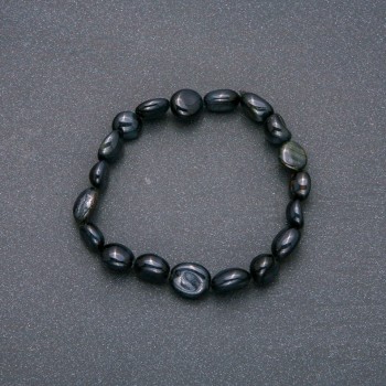 Bracelet made of natural Falcon's Eye stone on elastic with hammered texture, bead size 10x12 mm (±), circumference 18 cm