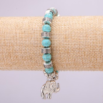 Turquoise Bracelet on Elastic, diameter 8(±)mm (name), length 18cm with inlays and Elephant Pendant